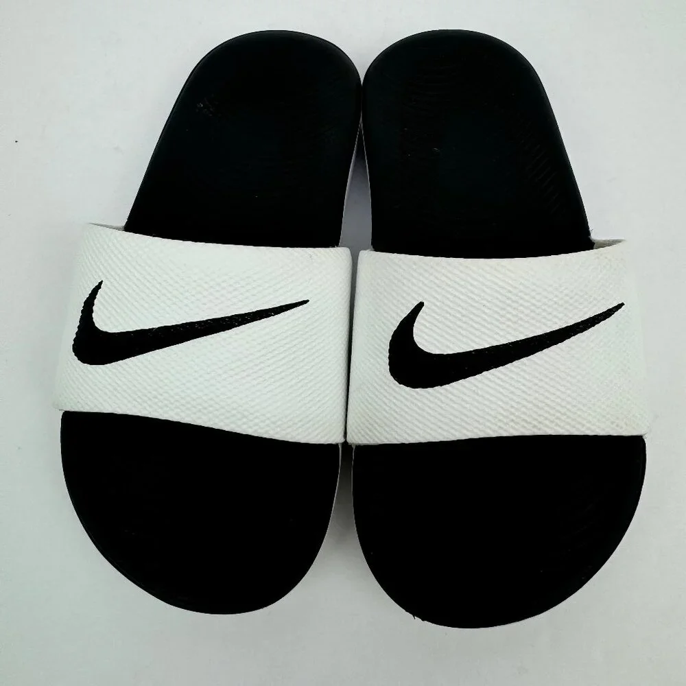 Nike Kawa kids sandal/ slides. Non slip rubber sole. Black, white.